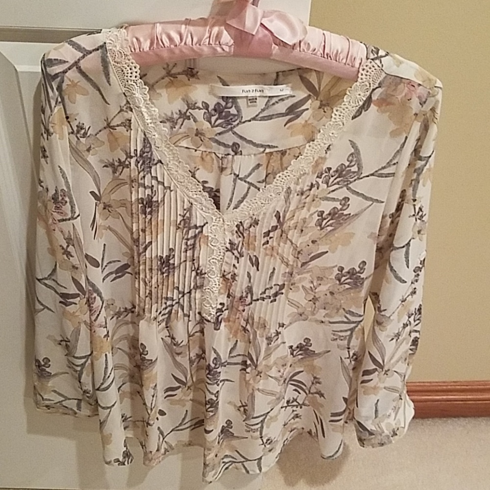 Beautiful sheer top.